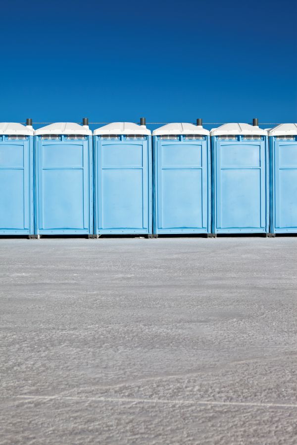 Event porta potty rentals set up for an outdoor gathering in Southern California